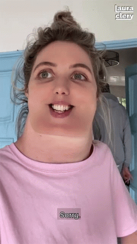 Woman Wearing Pink T-Shirt That Says Sorry
