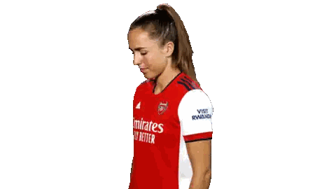 Woman Wearing Red Emirates Soccer Jersey