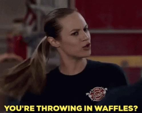 Woman Wearing Shirt Saying You're Throwing In Waffles