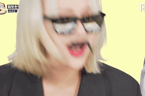 Woman Wearing Sunglasses and Black Jacket