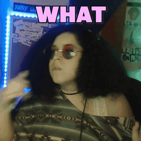 Woman Wearing Sunglasses And Choker Saying What GIF