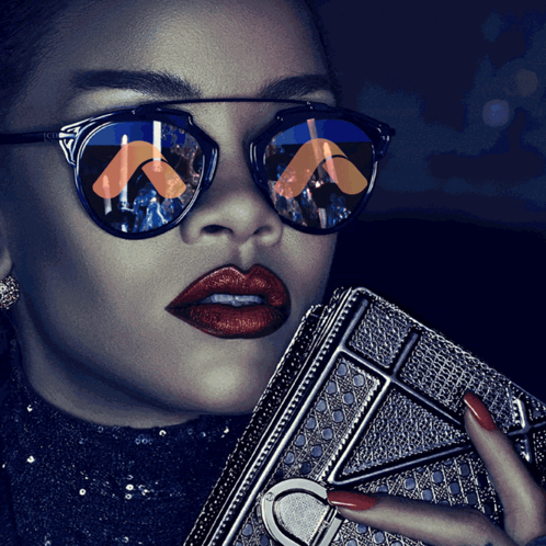Woman Wearing Sunglasses and Red Lipstick