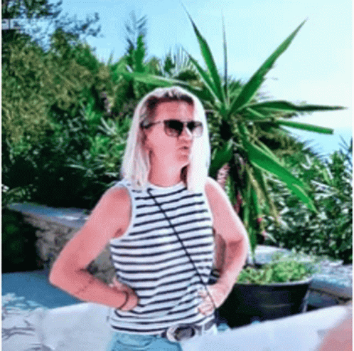 Woman Wearing Sunglasses and Striped Tank Top