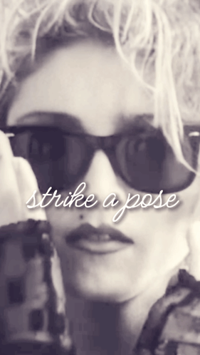 Woman Wearing Sunglasses Strike a Pose