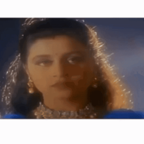 Woman Wearing Veil And Earrings GIF