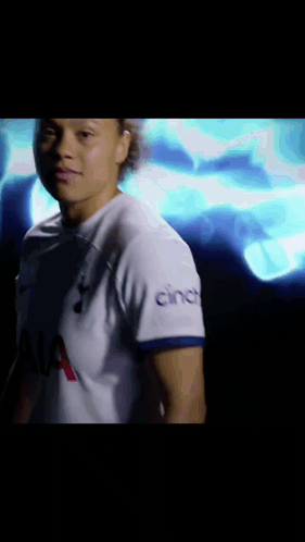 Woman Wearing White Cinco Shirt