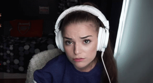 Woman Wearing White Headphones Arsenal Shirt