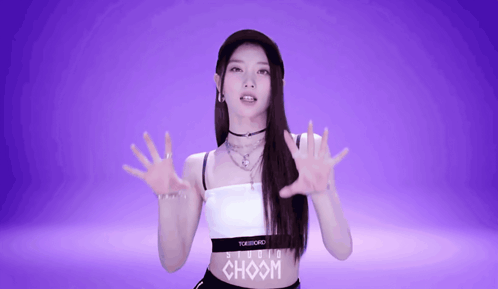 Woman Wearing White Top with Choom Waistband