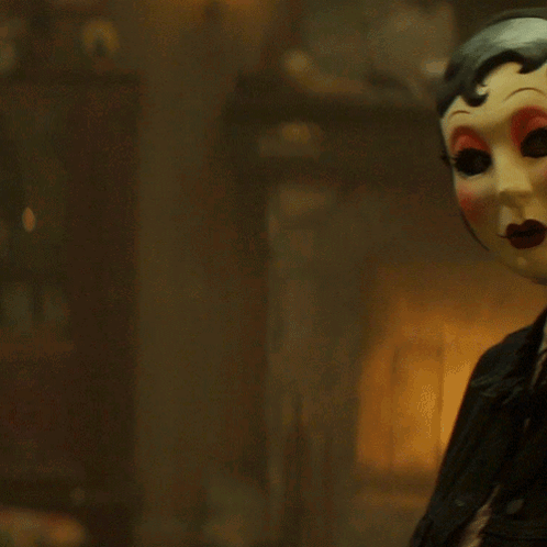 Woman Wearing Yellow Mask with Red Lips