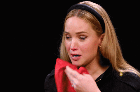 Woman Wipes Face With Red Cloth Saying What Do GIF
