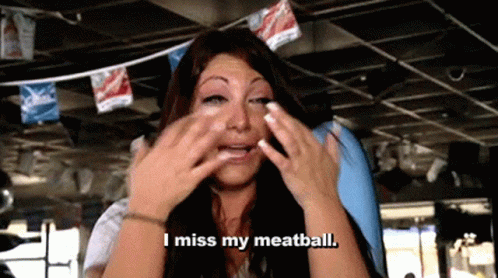 Woman Wiping Eyes Saying I Miss My Meatball
