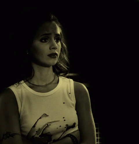 Woman With Arm Tattoo In White Tank Top GIF