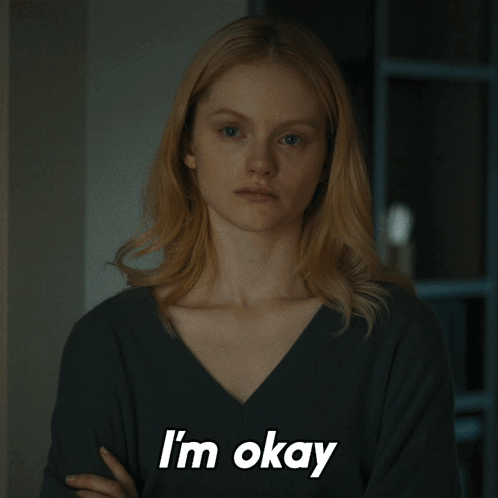 Woman With Arms Crossed Saying I'm Okay GIF