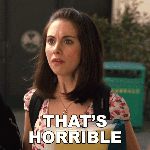 Woman With Backpack Saying That's Horrible GIF