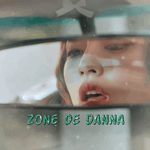 Woman With Bandage In Rear View Mirror GIF