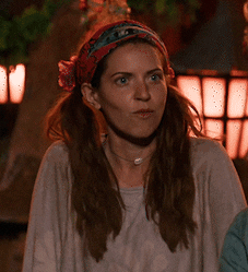 Woman With Bandana and Necklace Looks Serious