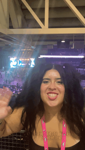 Woman with Behind The Scenes Smiles Lanyard