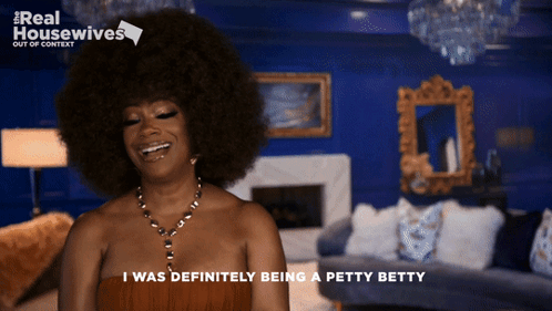 Woman With Big Afro Smiling I Was Definitely Being a Petty Betty