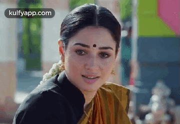 Woman With Bindi In Yellow Saree GIF
