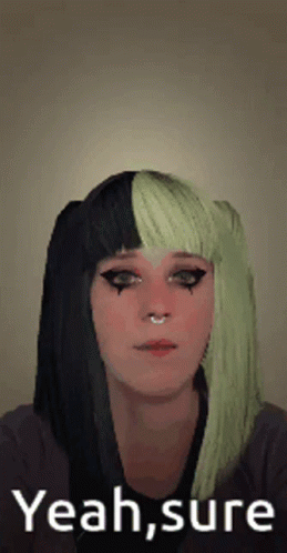 Woman With Black And Green Hair Making Funny Face Saying Yeah Sure GIF