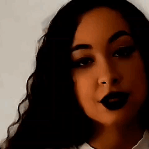 Woman With Black Lipstick and Nose Ring