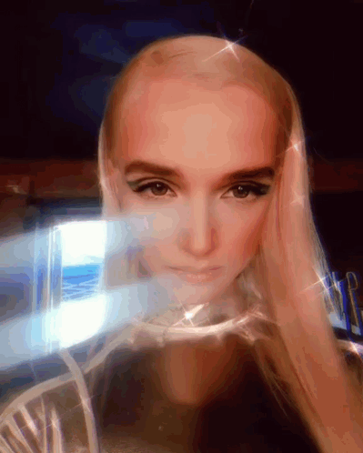 Woman with Blonde Hair Looking at Camera
