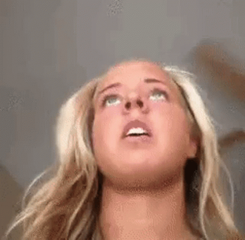 Woman With Blonde Hair Looking Up