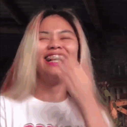 Woman with Blonde Hair Making Funny Face