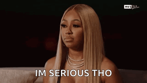 Woman with Blonde Hair Saying Im Serious Tho