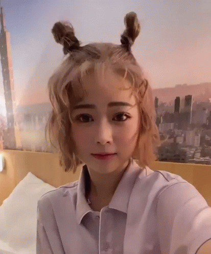 Woman With Blonde Hair Taking Selfie