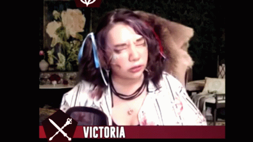 Woman With Blood on Face Beside Microphone Victoria