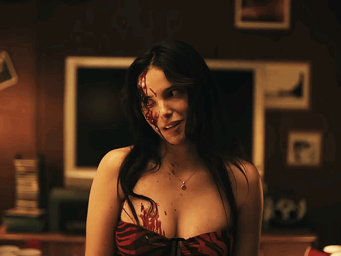Woman with Blood on Face Standing