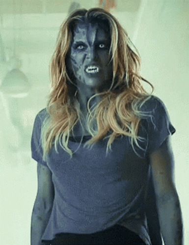 Woman With Blue Face Paint GIF