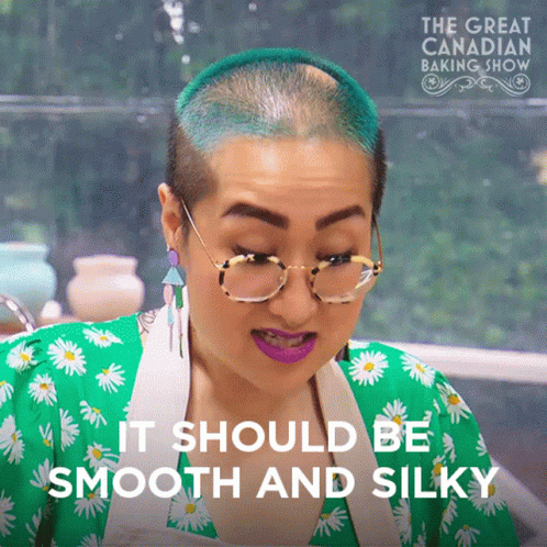 Woman with Blue Hair and Glasses Saying It Should Be Smooth and Silky