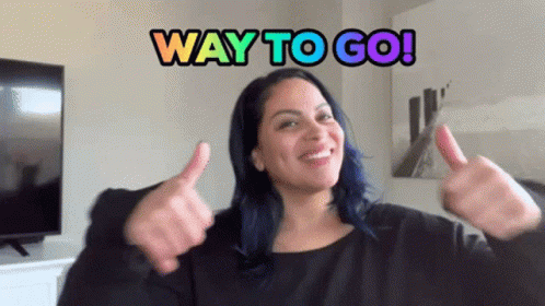 Woman with Blue Hair Giving Thumbs Up