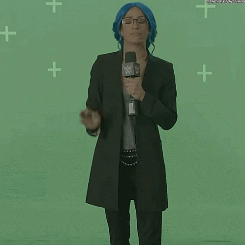Woman with Blue Hair in Front of Green Screen