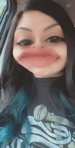 Woman with Blue Hair Making Funny Face