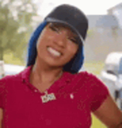 Woman with Blue Hair Red Shirt Black Hat