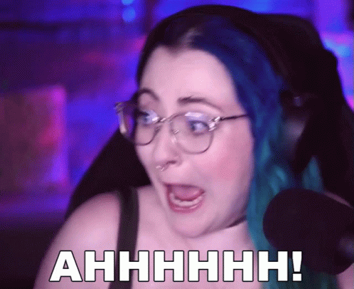 Woman With Blue Hair Saying Ahhhh Into Mic