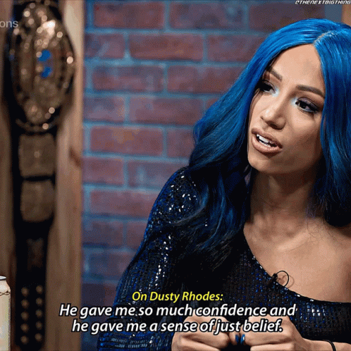 Woman with Blue Hair Saying Dusty Rhodes