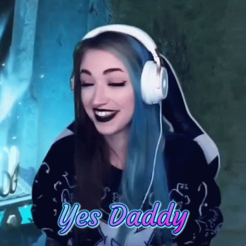 Woman with Blue Hair Smiling in Headphones