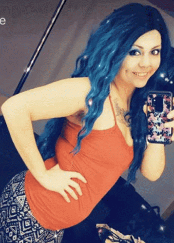 Woman With Blue Hair Taking Selfie GIF