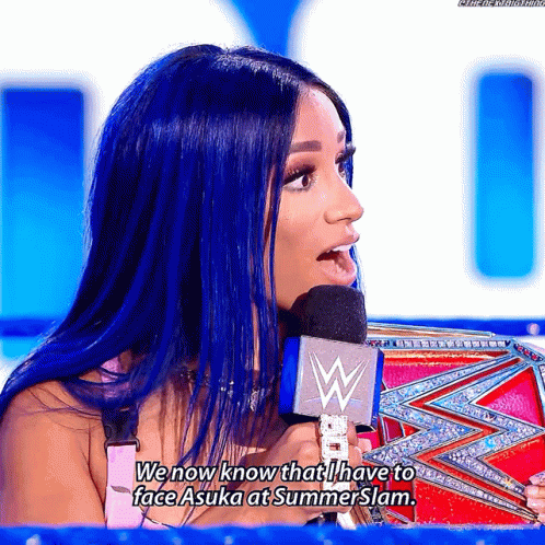 Woman With Blue Hair Talking Into Microphone Says We Now Know That I Have to Face Asuka at Summerslam