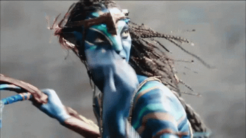 Woman With Blue Paint Holding Rope GIF