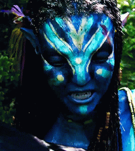 Woman With Blue Paint Holding Rope GIF