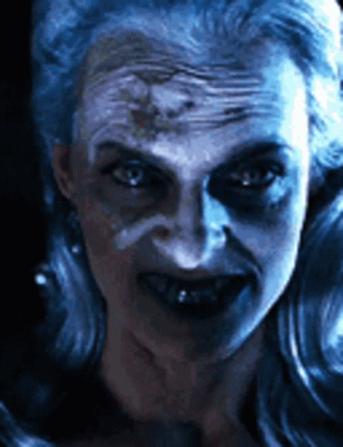 Woman With Blue Paint On Face GIF