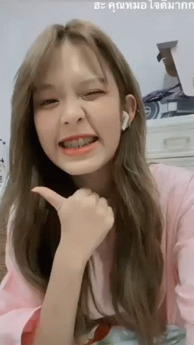 Woman With Braces Giving Thumbs Up GIF