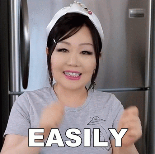 Woman With Braces in Grey Shirt Saying Easily