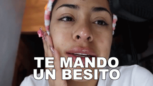 Woman With Braces Saying Te Mando Un Besito