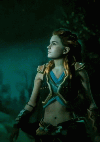 Woman With Braided Hair And Crop Top In Dark Forest GIF